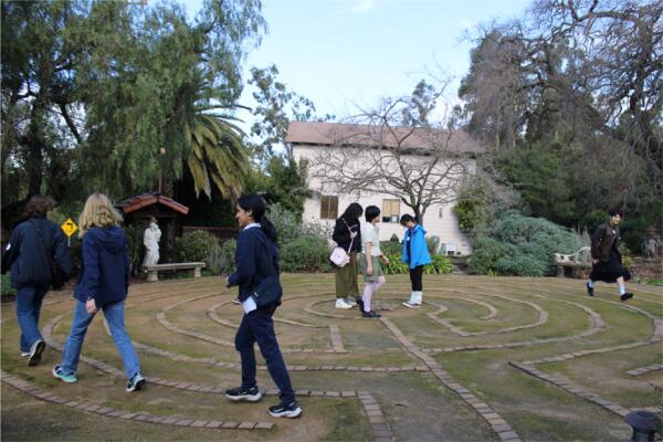 Students walking the maze